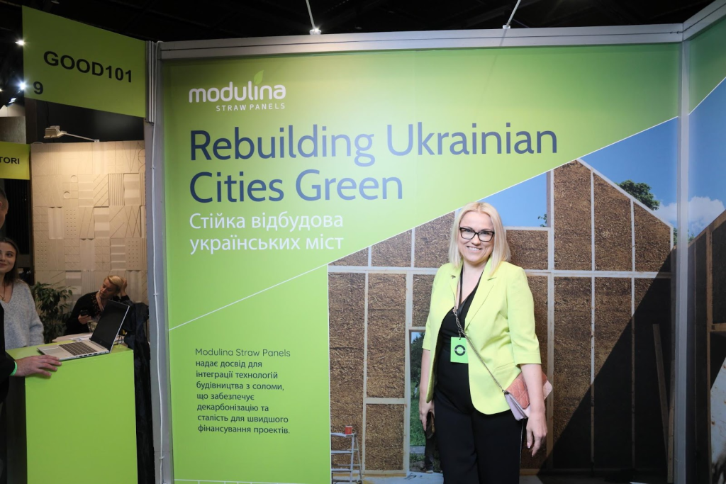  Kateryna Pylypchuk at the Modulina Straw Panels booth at Architectural Practice Event in Kyiv, Ukraine, promoting the Rebuilding Ukrainian Cities Green Initiative. Modulina Copyrights.